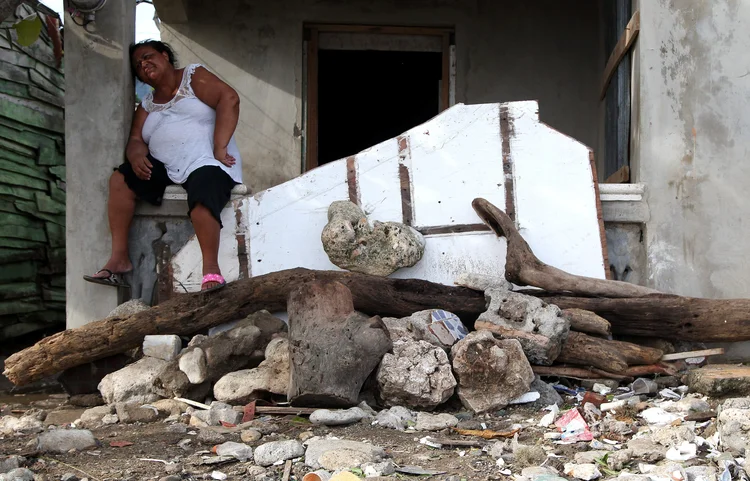 Furacão: as chuvas associadas ao Irma continuam a afetar parte da República Dominicana (Ricardo Rojas/Reuters)