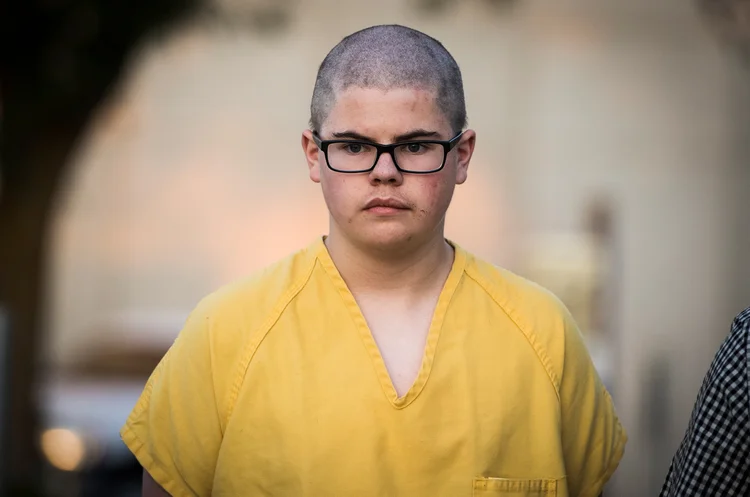 Atirador suspeito: depois que a pistola falhou, o porteiro da escola conseguiu que ele a soltasse e se rendesse (Courtesy Colin Mulvany/The Spokesman-Review/Reuters)