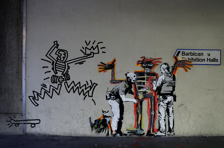 Mural pintando por Banksy em Londres: a 1ª grande mostra de Basquiat no Reino Unido começará na quinta (Peter Nicholls/Reuters)