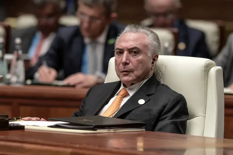 Michel Temer: o que se discute é uma possível destituição da comissão caso o deputado se recuse a deixar a função. (Fred Dufour/Reuters)