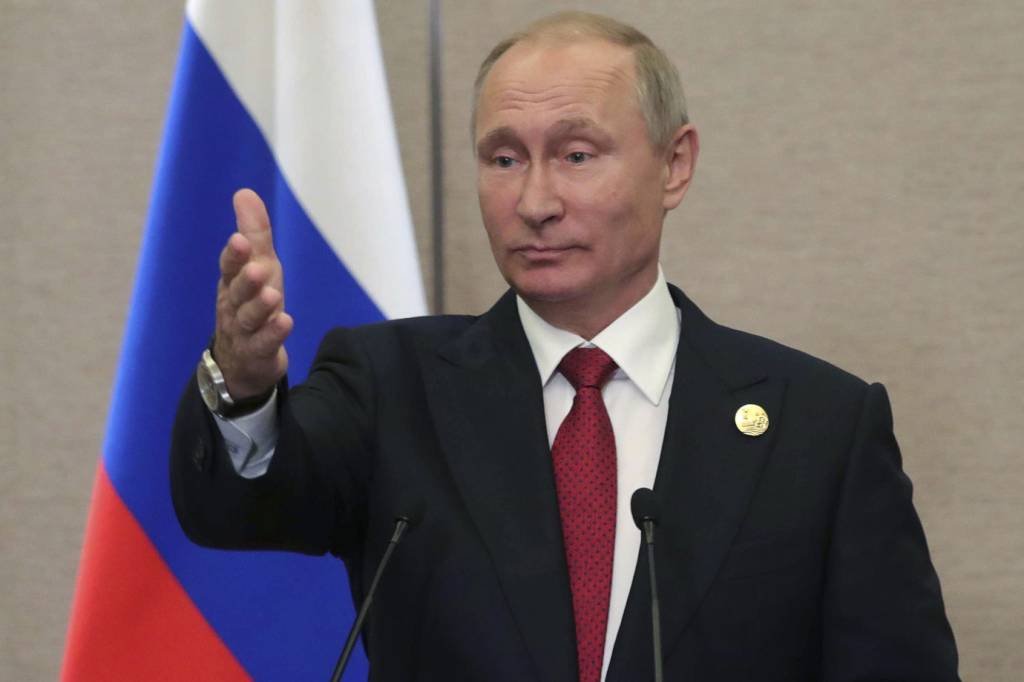 O presidente russo Vladimir Putin: criação de ambiente regulatório para moedas digitais (Sputnik/Mikhail Klimentyev/Kremlin/Reuters)