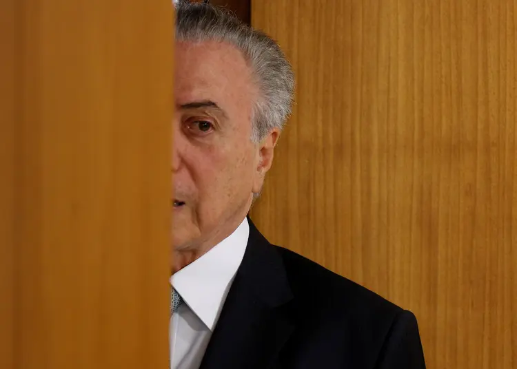 O presidente brasileiro Michel Temer chega a cerimônia no Palácio do Planalto em Brasília, no Brasil (Adriano Machado/Reuters)