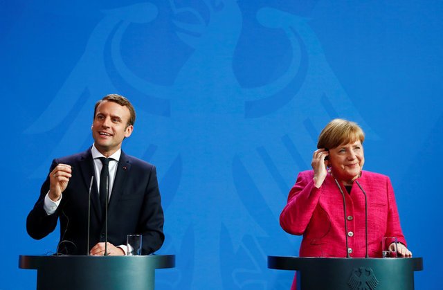 MACRON E MERKEL: crescimento estável em 2% desde 2015 mostra uma Europa muito mais robusta do que há alguns anos / Fabrizio Bensch | Reuters