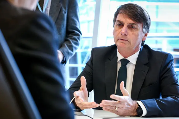 Jair Bolsonaro disse que, caso seja eleito, entregará o Ministério da Agricultura de "porteira fechada" para o setor indicar técnicos, do ministro aos assessores (./Bloomberg)