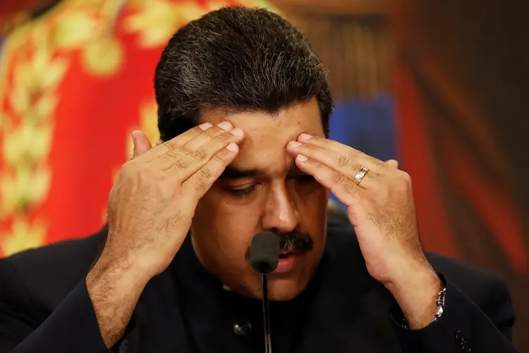 Nicolás Maduro: oito magistrados solicitaram a detenção de Maduro, assim como uma instância a Interpol para que lance um "alerta vermelho em nível mundial" com o objetivo de capturá-lo (Carlos Garcia Rawlins/Reuters)