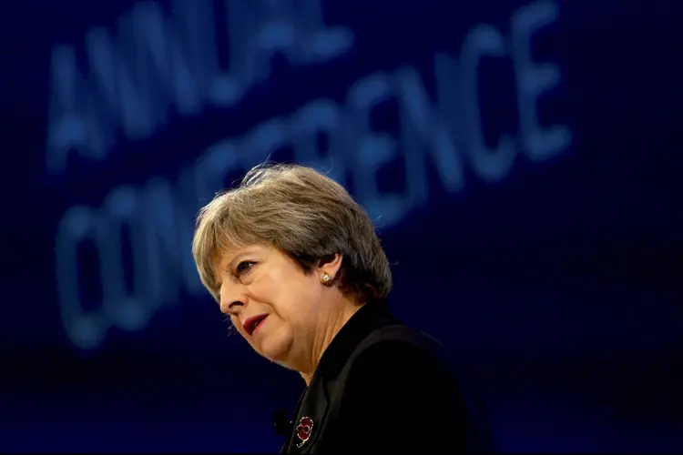Theresa May: primeira-ministra britânica não chegou a uma decisão final se o Reino Unido participaria de algum ataque feito pelos EUA e França na Síria (Mary Turner/Reuters)