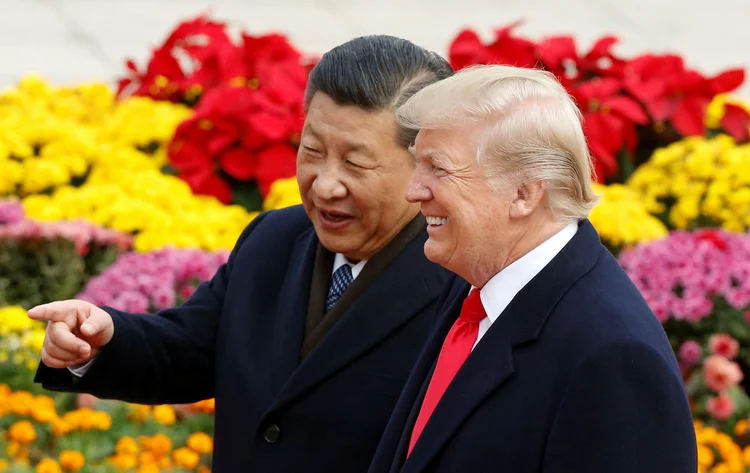 Trump e Xi: líderes trocaram pontos de vista sobre a recente melhora na situação diplomática na península coreana (Thomas Peter/Reuters)