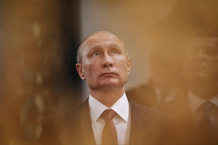 Vladimir Putin: Depois de votar em Moscou, ele assegurou que ficará satisfeito com qualquer resultado que lhe permitir "exercer a função de presidente". (Sputnik/Alexei Nikolsky/Kremlin/Reuters)