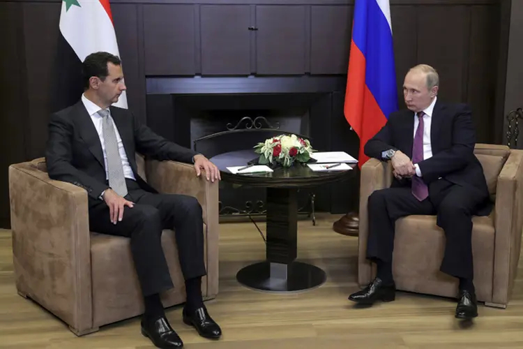 Putin e Assad tiveram conversas bilaterais antes de se reunirem com comandantes militares russos (Mikhail Klimentyev/Reuters)