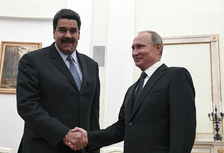 PRESIDENTES: Maduro e Putin são candidatos à presidência da Venezuela e Rússia, respectivamente, no ano que vem  (Yuri Kadobnov/Reuters)