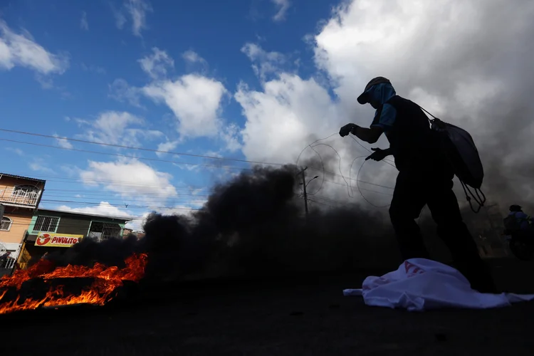 Tegucigalpa: atraso na contagem dos votos da eleição gerou onda de violência (Edgard Garrido/Reuters)