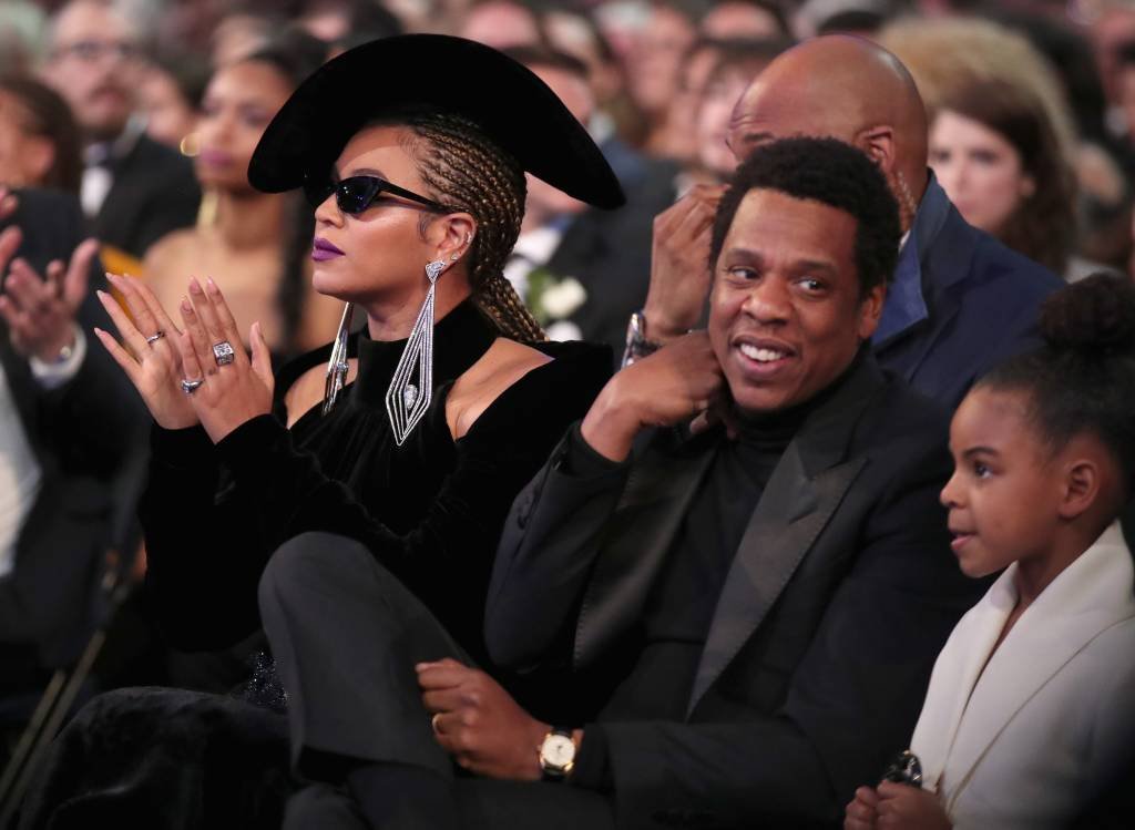 Jay-Z ao lado da esposa Beyonce e a filha durante a premiação: Trump apontou o recorde de níveis mínimos de desemprego (Christopher Polk/Getty Images)