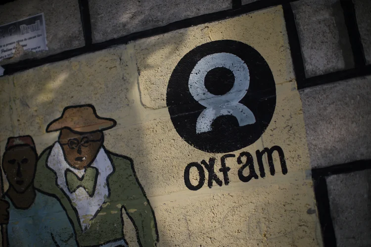 An Oxfam sign is seen on a wall in Corail, a camp for displaced people of the earthquake of 2010, on the outskirts of Port-au-Prince, Haiti, February 17, 2018. REUTERS/Andres Martinez Casares (Andres Martinez Casares/Reuters)