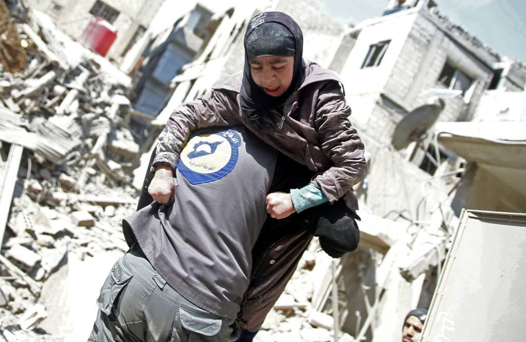 Moradores da região síria de Ghouta Oriental "esperam pela morte"
