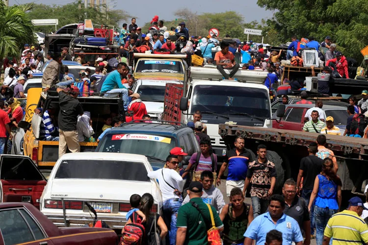 Venezuelanos: Tidd destacou que a maior preocupação com a Venezuela é o "enorme fluxo" cidadão pela América do Sul e o impacto nos países vizinhos (Jaime Saldarriaga/Reuters)