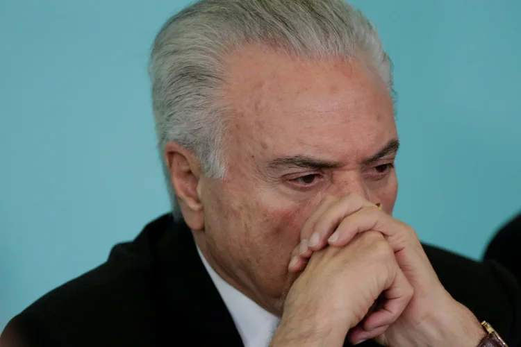 Michel Temer: jornalistas questionaram o presidente sobre se desistência da candidatura seria confirmação do nome de Henrique Meirelles como pré-candidato do MDB (Ueslei Marcelino/Reuters)