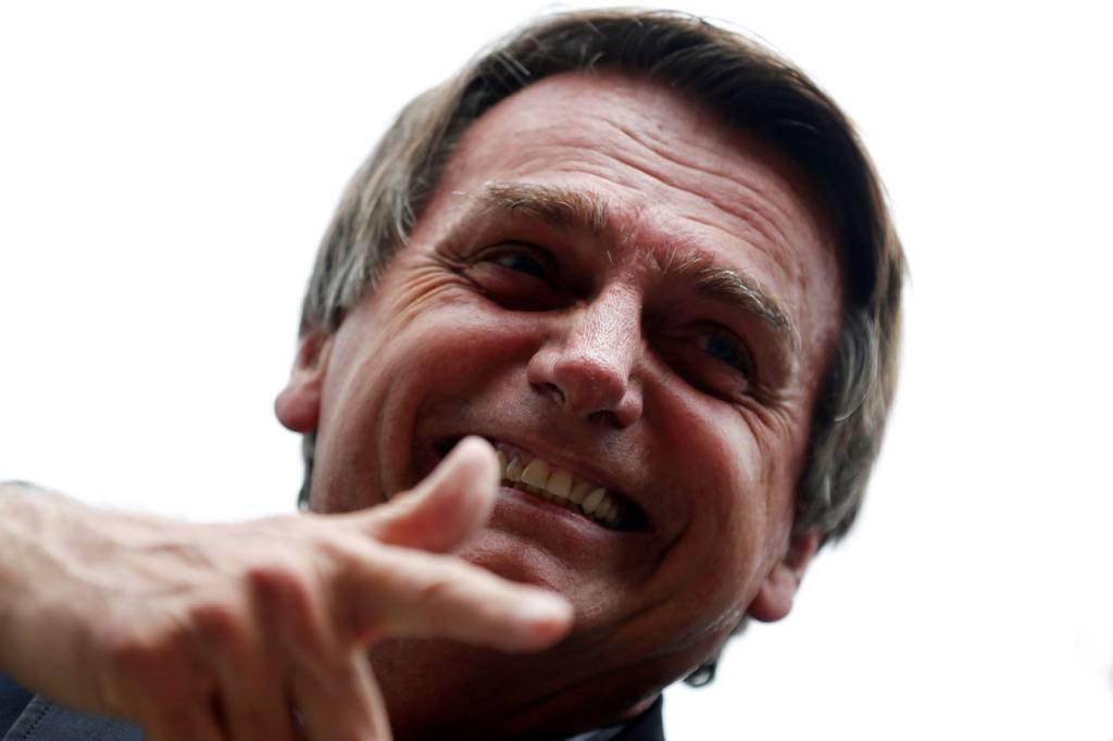 Jair Bolsonaro: "Na próxima vez quero ver 200 pessoas armadas aqui dentro", disse ele, sob aplausos, ao participar de um almoço de adesão em Curitiba (Rodolfo Buhrer/Reuters)