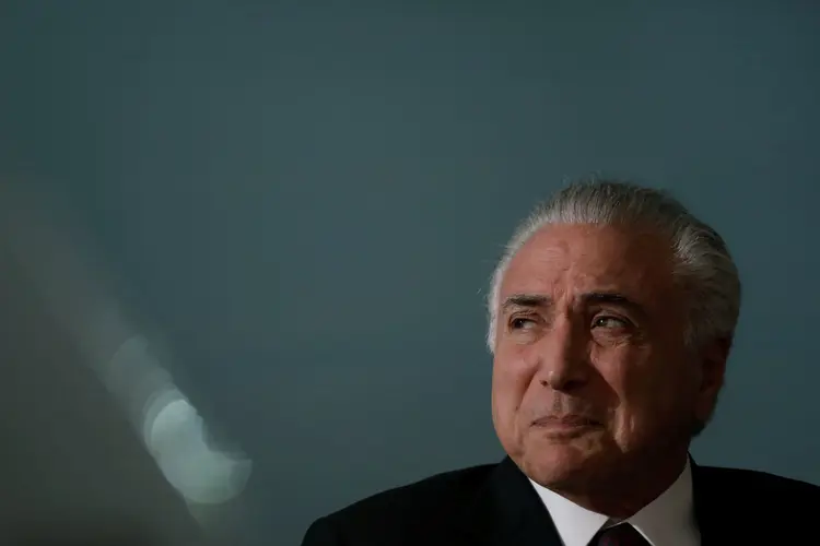 Michel Temer: presidente exigiu que aqueles que ficassem no governo se comprometessem em apoiar a candidatura governista (Ueslei Marcelino/Reuters)