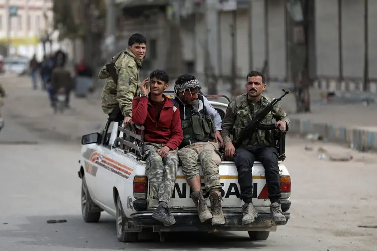 A Síria condena a ocupação turca em Afrin e exige a retirada imediata das forças invasoras dos territórios sírios, diz relatório sírio (Khalil Ashawi/Reuters)