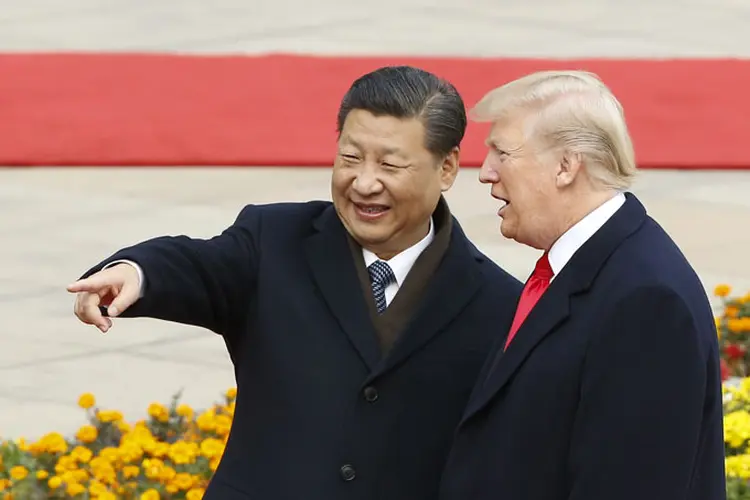 Xi e Trump: os dois líderes estão em tensões comerciais há meses, após anúncio de taxação de produtos chineses por Trump (Pool/Getty Images)