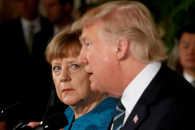 Angela Merkel não conseguiu progressos significativos para convencer Donald Trump a conceder isenções às tarifas da UE (Jonathan Ernst/Reuters)