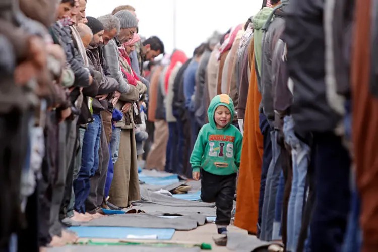 Síria: segundo estimativas da ONU, cerca de 13 milhões de pessoas, incluindo 6 milhões de crianças, estão precisando de ajuda humanitária no país (Omar Sanadiki/Reuters)