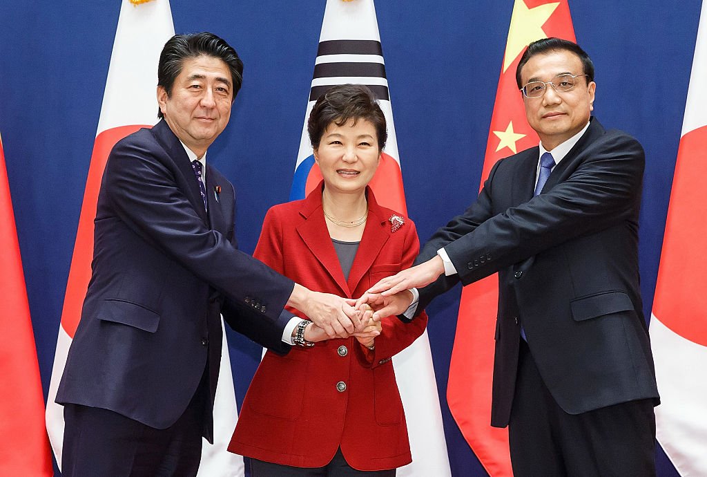 Três vizinhos asiáticos se reúnem para discutir conversas com Kim Jong-un