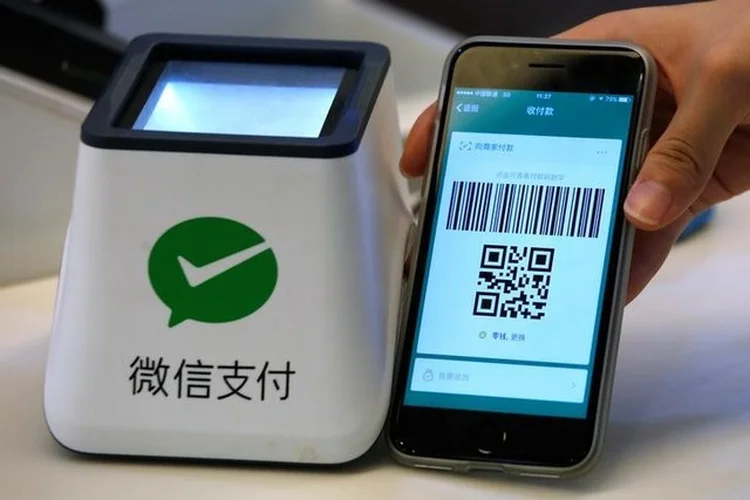 WECHAT PAY: o serviço do apliativo já é utilizado por milhões de pessoas, no mundo todo / Bobby Yip/ Reuters