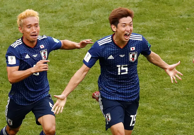Jogadores do Japão comemoram vitória contra a Colômbia por 2x1 na estreia na Copa do Mundo 2018 (Damir Sagolj/Reuters)