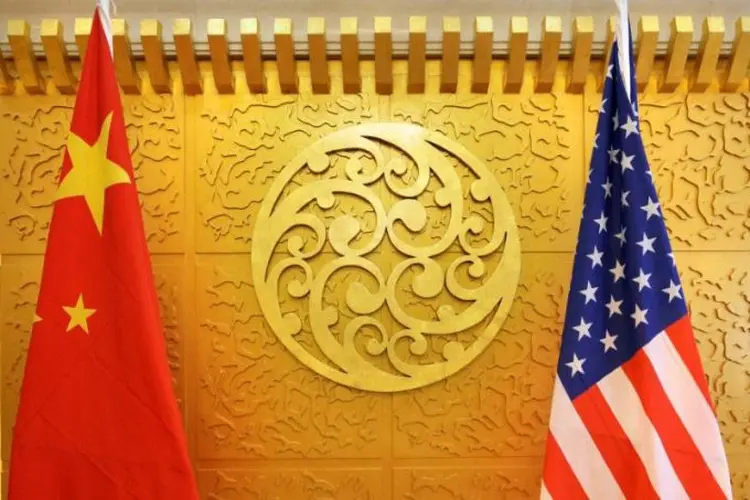 Os EUA dizem que a China faz transferência forçada de tecnologia e propriedade intelectual (Jason Lee/Reuters)