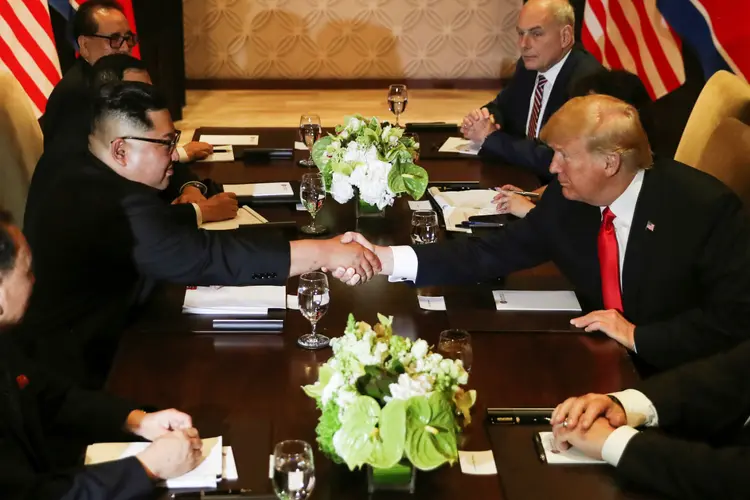 Kim Jong Un e Donald Trump em cúpula histórica em Singapura (Jonathan Ernst/Reuters)