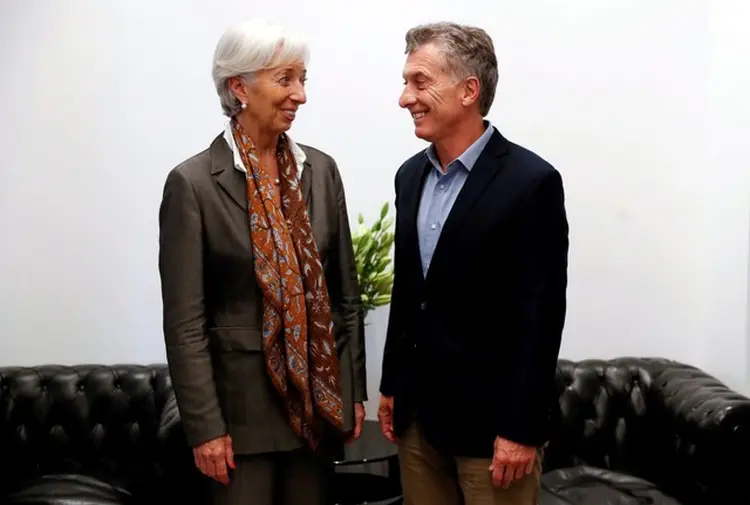 Christiane Lagarde, do FMI, e Mauricio Macri: previsão de crescimento do PIB do país foi revista para 1,5% em 2018  (David Fernandez/Reuters)