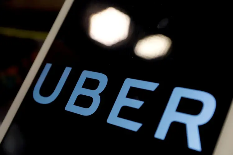 Logo da empresa Uber mobilidade app. (Tyrone Siu/Reuters) (Tyrone Siu/Reuters)