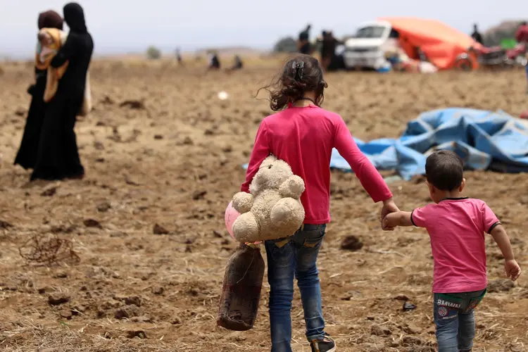 Síria: segundo a ONU, "até 180 mil pessoas" já fugiram da "recente onda de violência" no sul do país (Alaa Al-Faqir/Reuters)