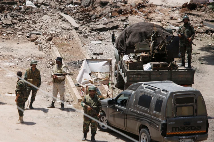 Síria: regime de Bashar al-Assad recuperou cerca de 30 localidades rebeldes na província (Omar Sanadiki/Reuters)