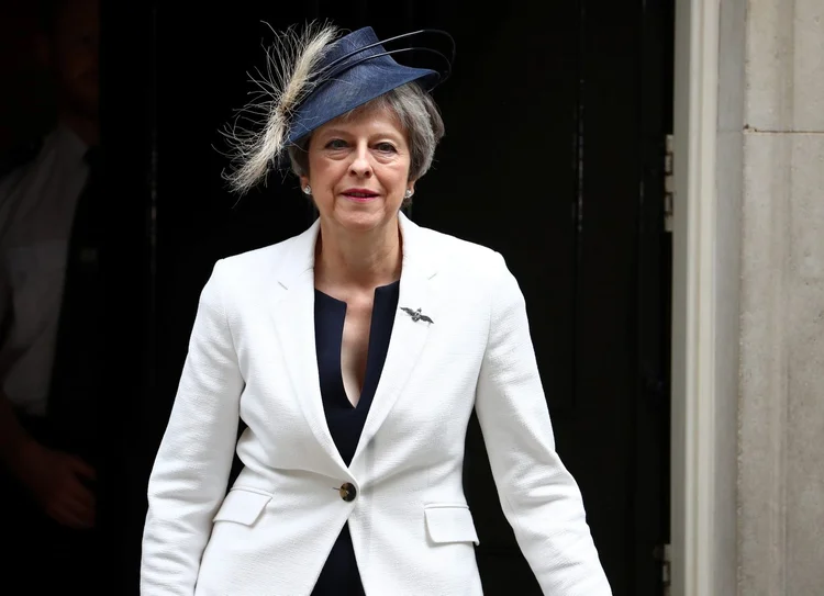 May: Se não obtiver uma maioria dos 316 votos no Parlamento, um novo deputado conservador poderá pleitear a chefia do governo (Hannah McKay/Reuters)