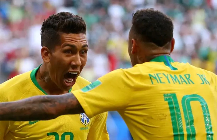 Firmino e Neymar do Brasil: seleção é apontada como favorita pelas principais casas de análises   (Michael Dalder/Reuters)