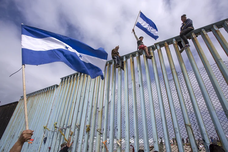 Honduras: imigrantes fogem da violência e da crise econômica que assolam o país (David McNew/Reuters)