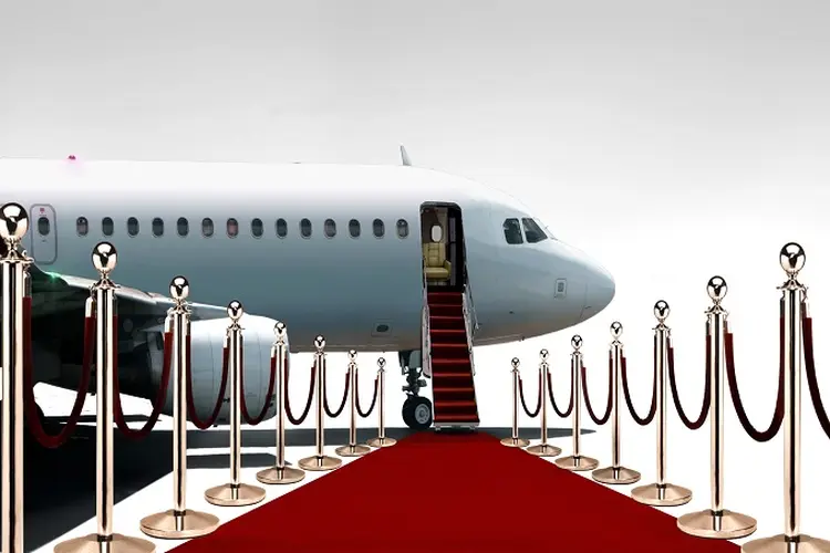 Private airplane boarding on red carpet (razihusin/Thinkstock)