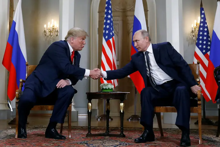 O presidente dos EUA, Donald Trump, e da Rússia, Vladimir Putin: americano convidou russo para visitar Washington ainda neste ano (Kevin Lamarque/Reuters)