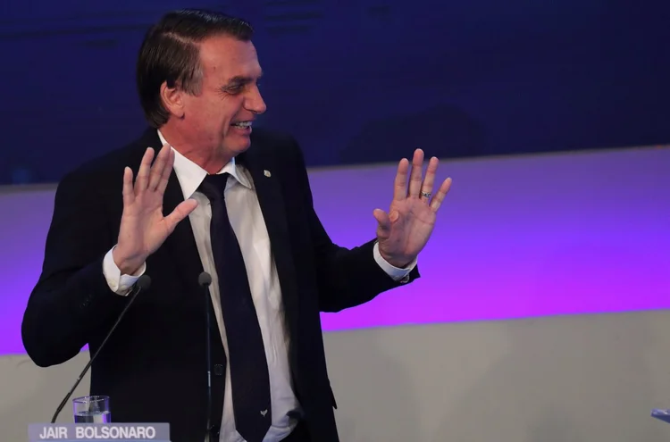 Presidential candidate Jair Bolsonaro of the Party for Socialism and Liberation (PSL) attends the first television debate at the Bandeirantes TV studio in Sao Paulo, Brazil August 9, 2018. REUTERS/Paulo Whitaker (Paulo Whitaker/Reuters)