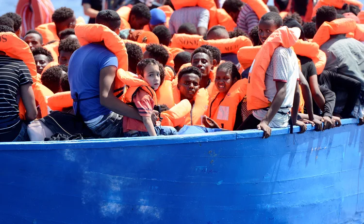 Imigração: no ano passado, cerca de 15 mil pessoas retornaram para seu país de origem (Guglielmo Mangiapane/Reuters)