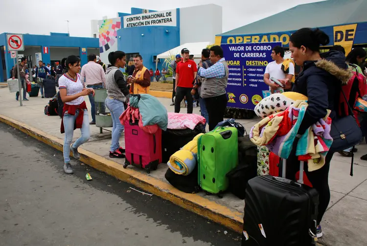 CIDADÃOS DESLOCADOS: Venezuelanos migram para o Peru. No total, 4 milhões já deixaram o país  (Douglas Juarez/Reuters)