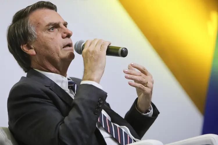 Mesmo ausente do debate promovido por TV Gazeta, Jair Bolsonaro (PSL) foi o segundo mais citado pelos adversários (Andre Coelho/Bloomberg/Bloomberg)