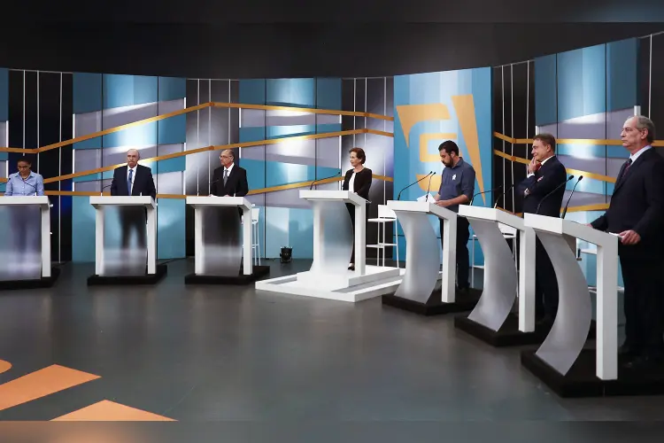 Candidatos em debate presidencial (Miguel Schincariol/AFP)