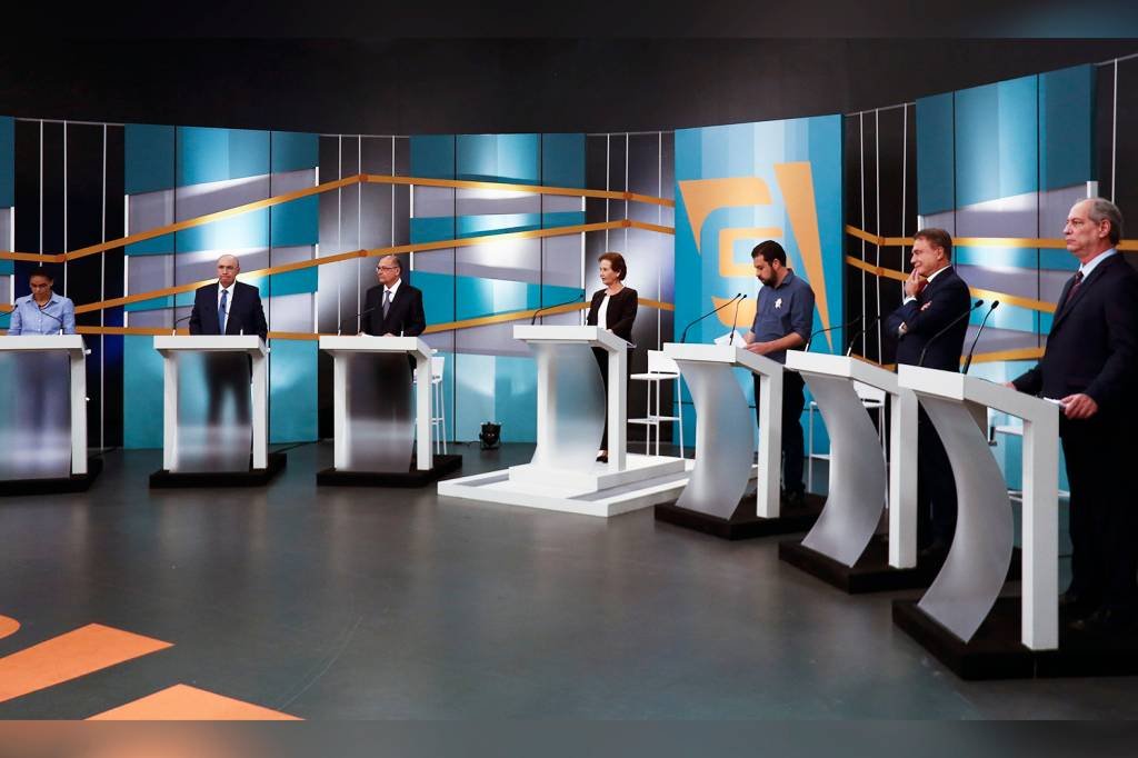 Candidatos em debate presidencial (Miguel Schincariol/AFP)