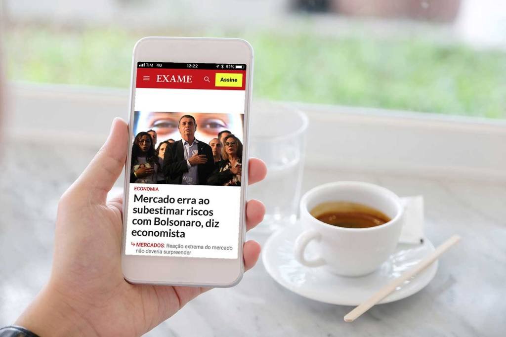 EXAME:  77% dos leitores acessam o site por meio do celular (Montagem de EXAME com foto de Mangpor_2004/Getty Images)