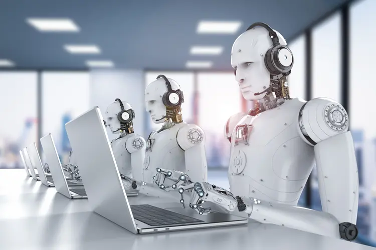 Robôs digitando em computadores (foto/Thinkstock)