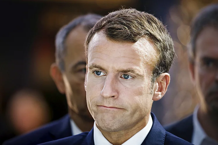 Emmanuel Macron: medidas parecem não ser suficientes para pôr fim à crise que começou há 3 semanas (Regis Duvignau/Reuters)