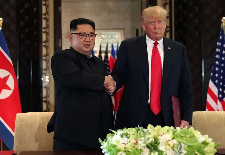 Donald Trump e Kim Jong-Un: presidente dos EUA considerou como "decepcionante" o fato de a Coreia do Norte estar reconstruindo a base de mísseis (Jonathan Ernst/Reuters)